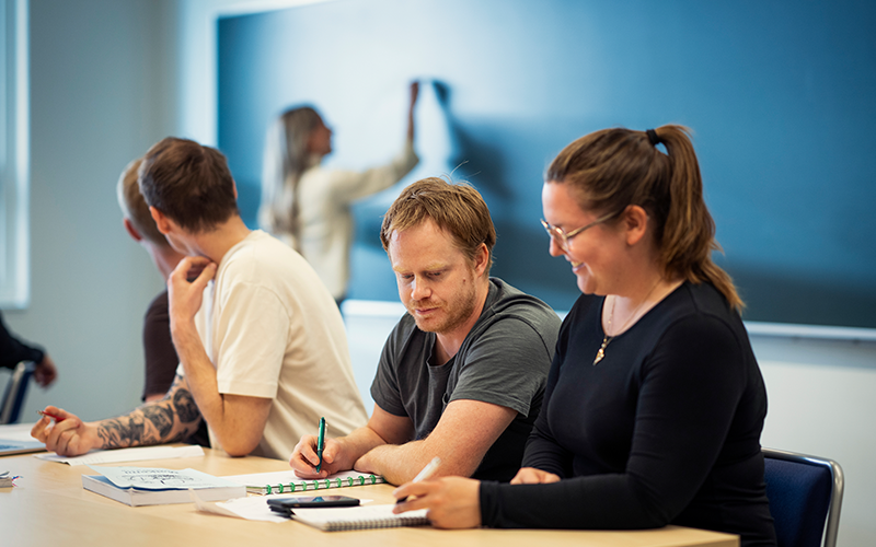 Students in a classroom. Photo.